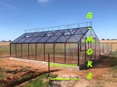 Brian installing his Grange 4m x 8m Greenhouse.